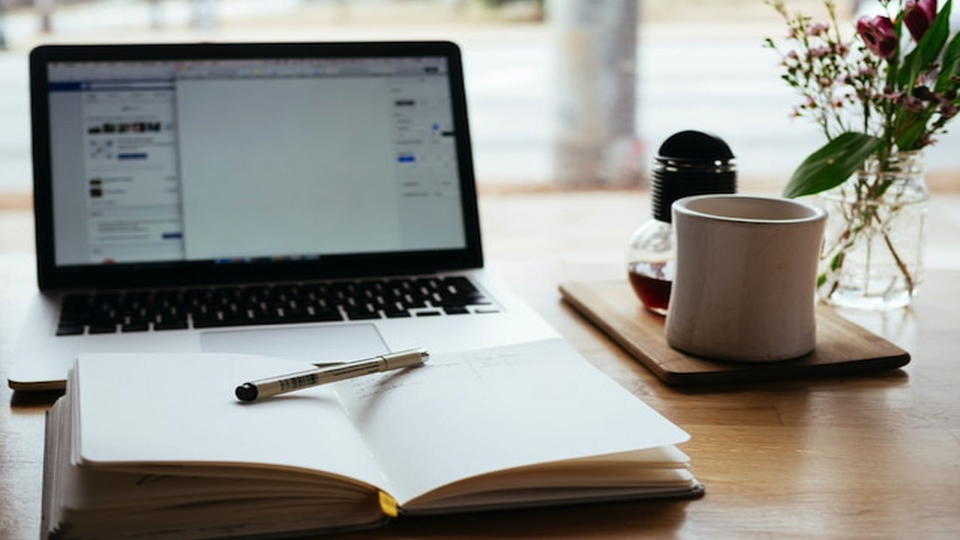 Church leaders reading ministry resources and guides